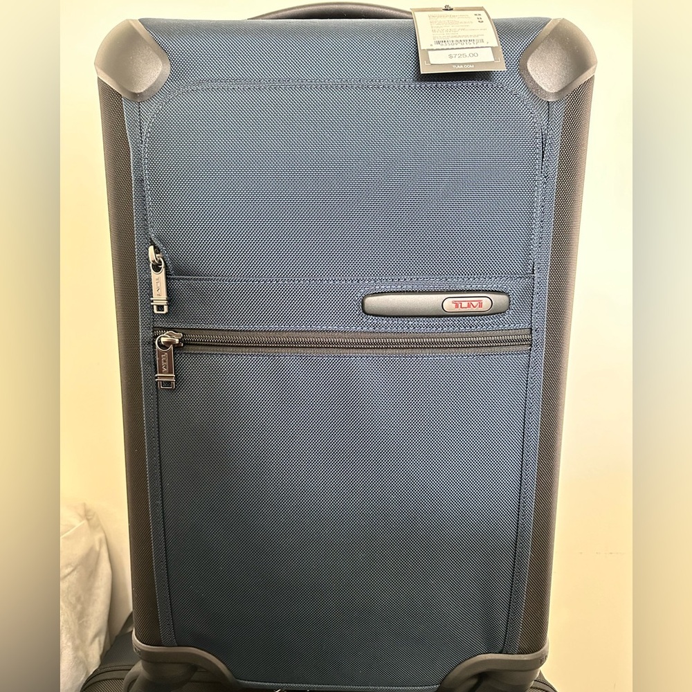 Tumi International Expandable 4-wheel carry on luggage NWT Blue